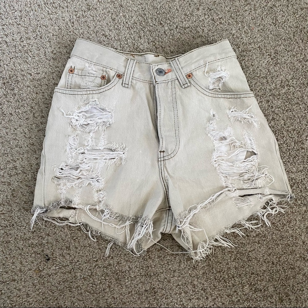 Levi’s high-waisted grey distressed jean shorts